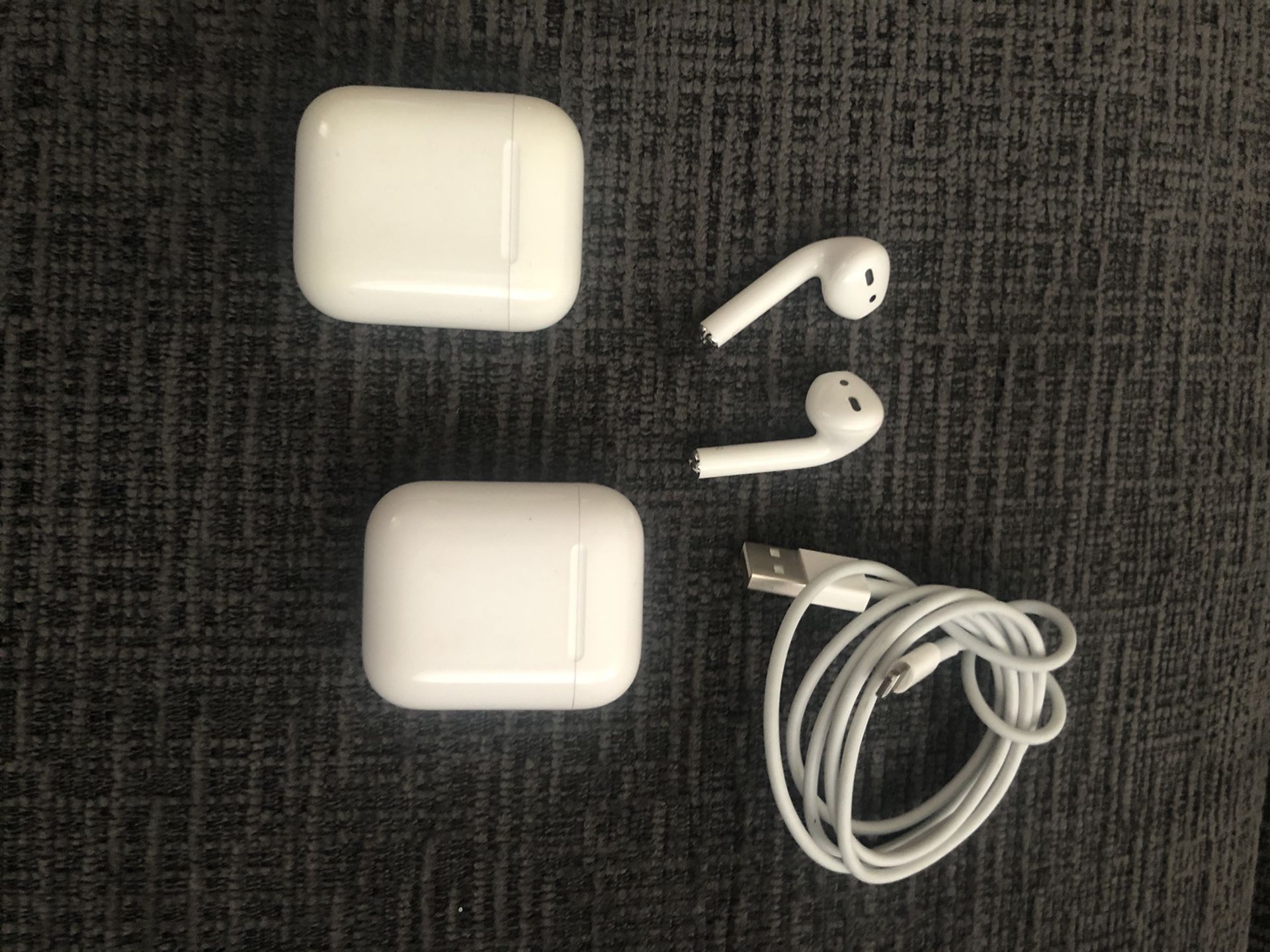 AirPods with 2 charging cases