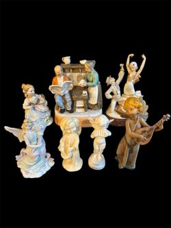 Rare Collection Of 7 Porcelain Statues 