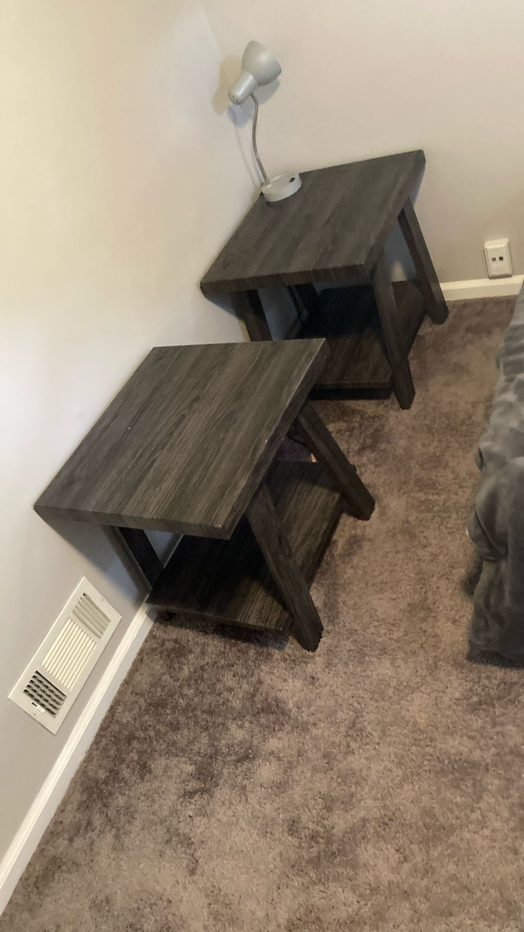 Two gray wood side tables