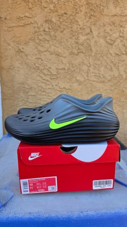 Nike size 10  Reactx Rejuven8 blk Volt