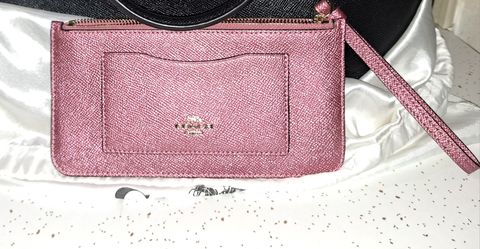 Coach metallic blush wristlet wallet