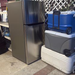 24 cu. ft. Top Mount Freezer Refrigerator with Multi-Flow Air System in Stainless Steel, Garage Ready