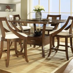 Solid wood high 4-seater dining set with drawer.