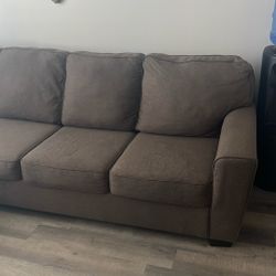 Mid-Large Size Taupe Sectional.