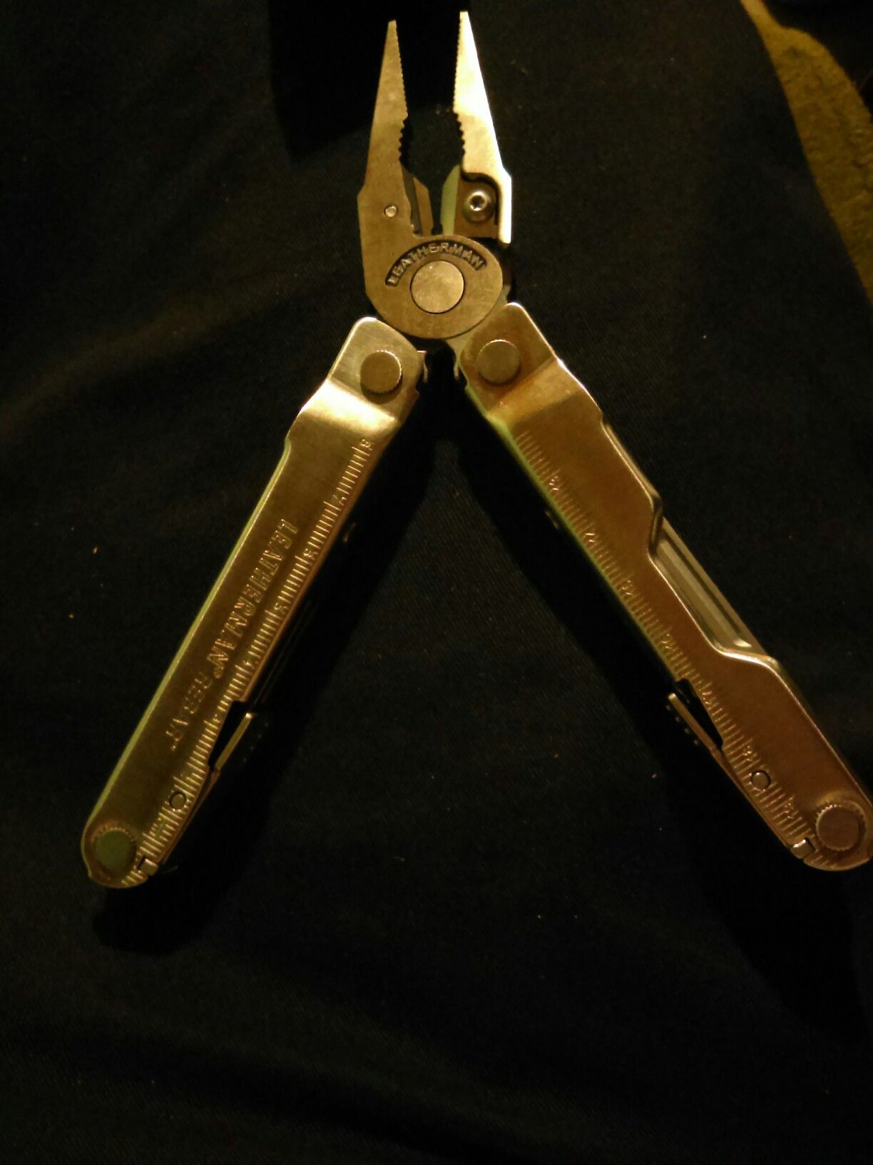 Brand new never used Leatherman "Rebar" w/case