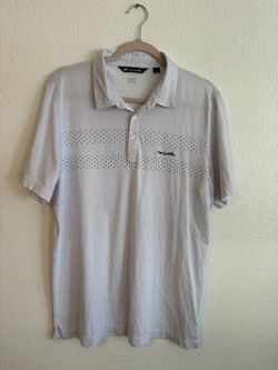 Men white Travis Mathew polo