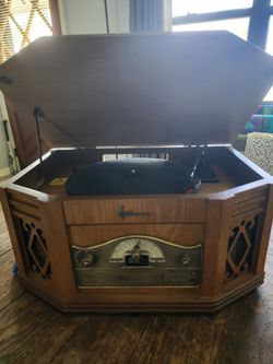 Emerson radio,record player,tape,and cd player