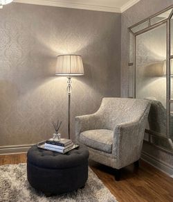 Accent chair and navy blue tufted storage ottoman