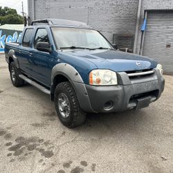 Nissan Frontier, 2003. Acepto carro a cambio