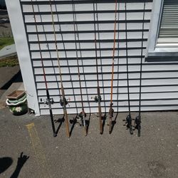 Older Big Reel Fishing Poles 