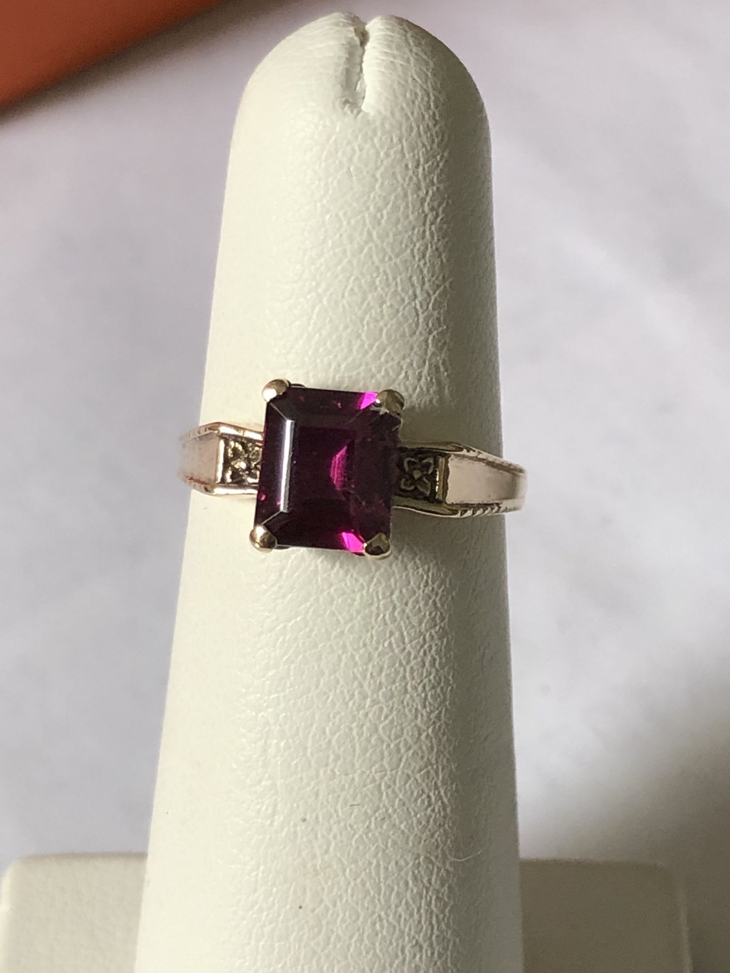 10k real gold ring , nice dark purple stone,1.89grams, size 5, please look at all pictures for more details