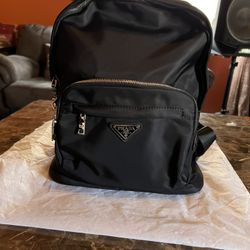 back pack and wristlet 