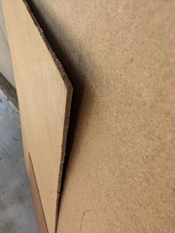 Free thin wood backing for bookcase