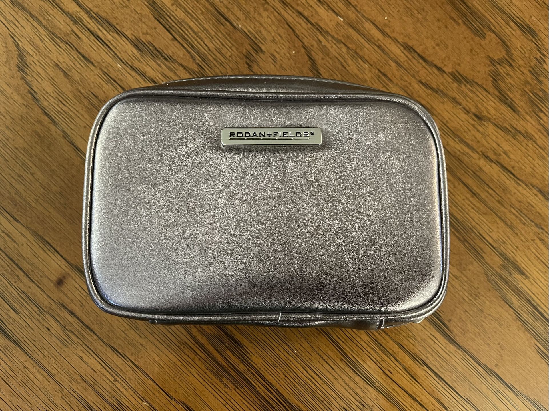 Rodan + Fields Silver Colored Cosmetics Bag With Mirror Inside