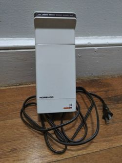 Norelco Travel Care Fabric Steamer/Wrinkle Remover Model TS 60