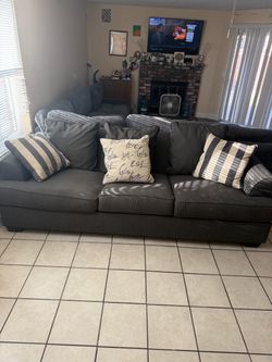 Anyone need a small couch?