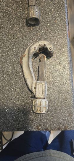 The highlighted tool is a RIDGID Model 205 Quick-Acting