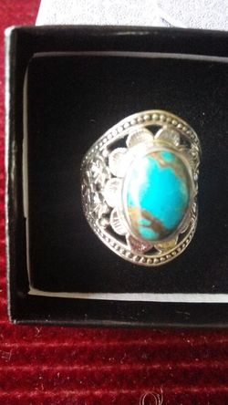 BLUE TURQUOISE STONE SET IN STERLING SILVER PLATINUM BOND