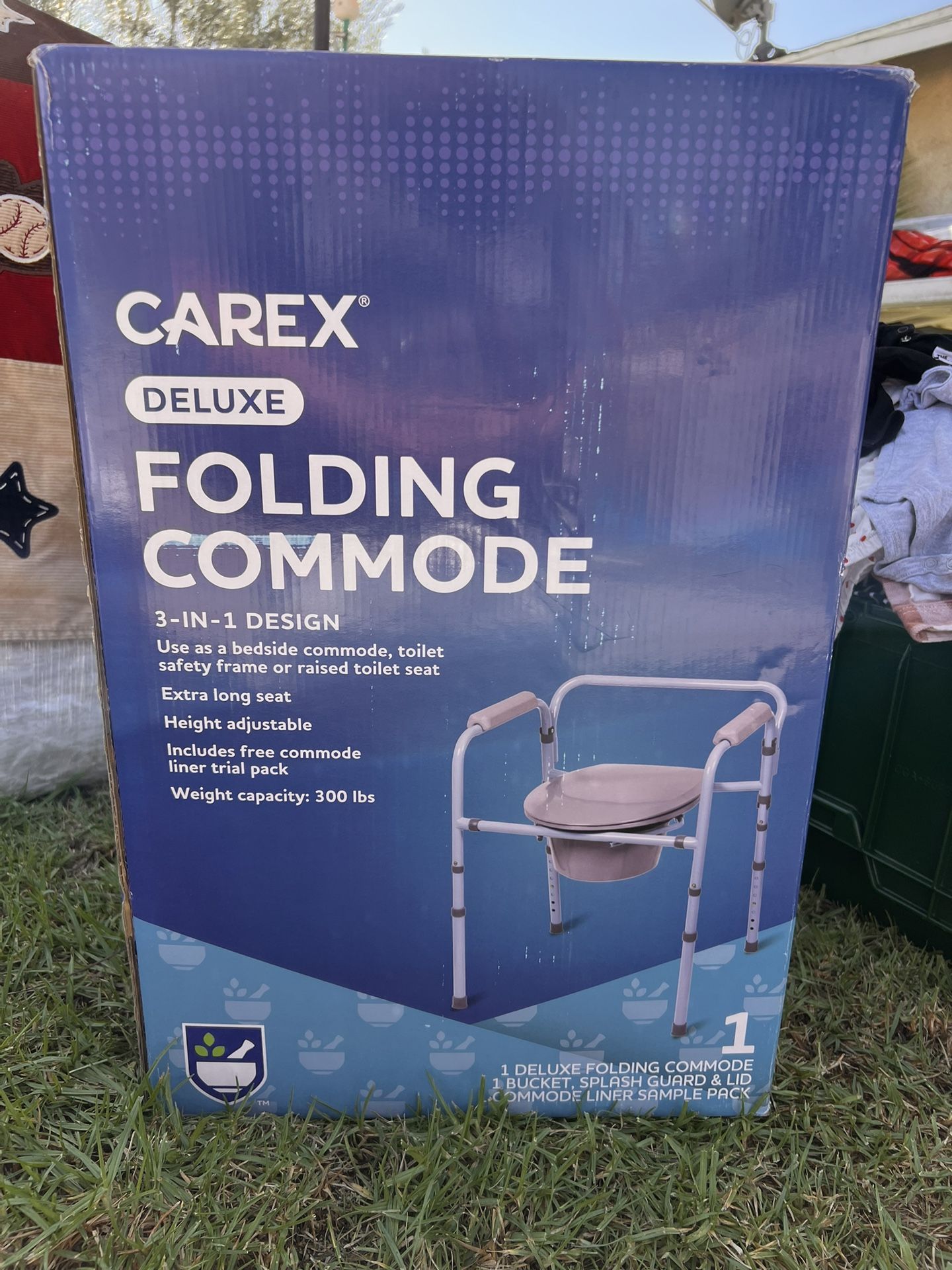 FOLDING COMMODE- NEW