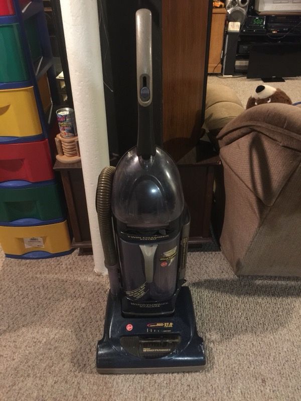 Hoover wind tunnel bag less twin chamber system with HEPA filter