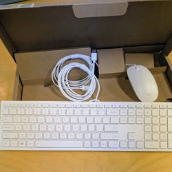 White HP corded mouse and matching keyboard. 