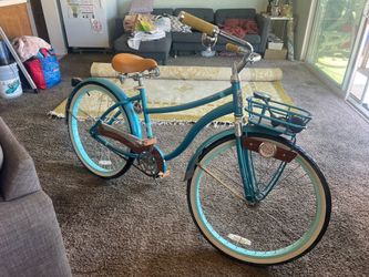 Woman’s Electric Blue Huffy Beach Cruiser