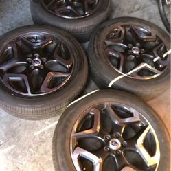 aluminium wheels and tires for subaru 5 lugs good condition size 18”