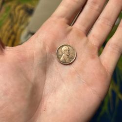 1951 wheat penny with no mint + ERROR ( L in Liberty is on the rim)