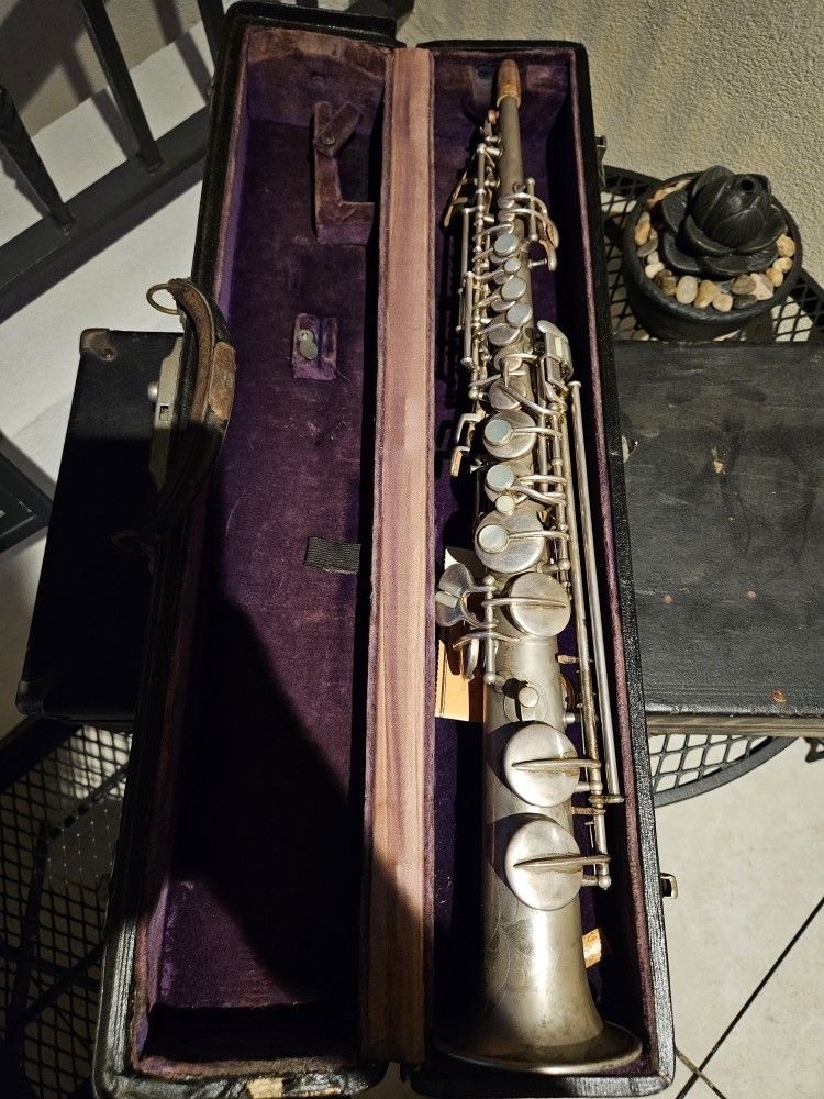 1925 Beuscher Alto Saxophone And A Soprano Sax