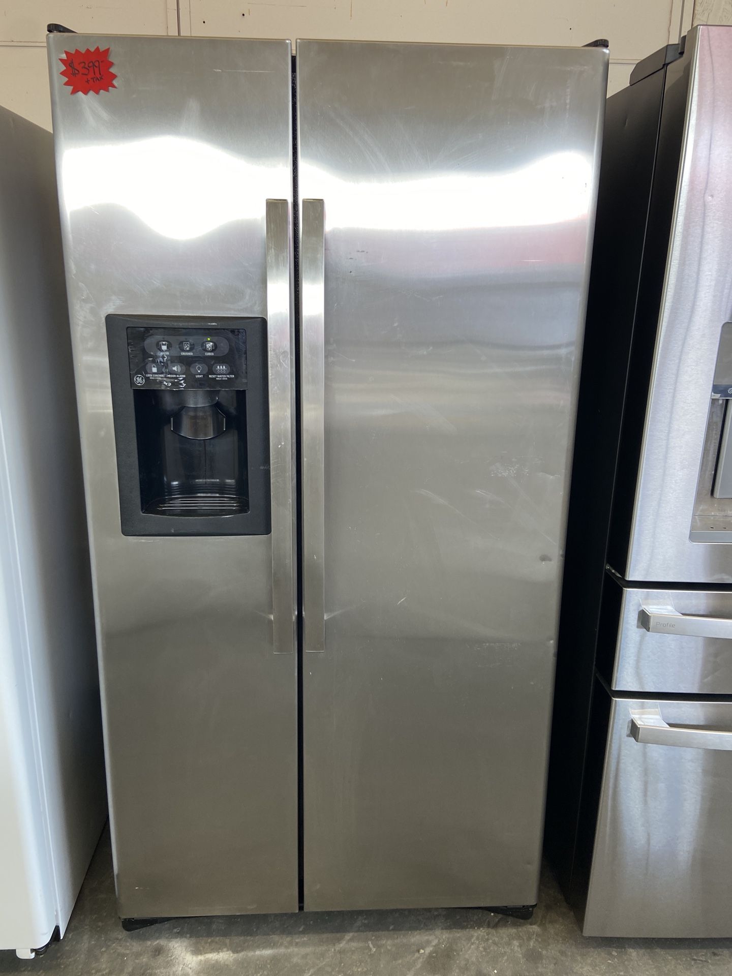 WHIRLPOOL STAINLESS STEEL SIDE BY SIDE REFRIGERATOR