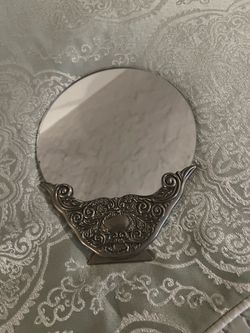 Hand mirror, Vintage with easel and ornate base.