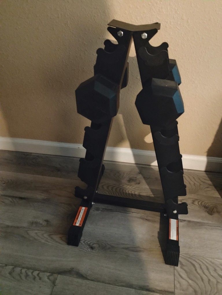 2 25 Pound Dumbbells And Stand