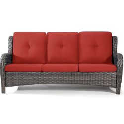 Brentwood wicker sofa with red cushion