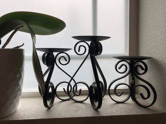 Three candle holders