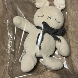 Naty Nature Babycare Organic Cotton Bunny Plush – Neutral White – Approx. 9–10”  ⸻  Description  Minimalist bunny plush by Naty Nature Babycare, featu