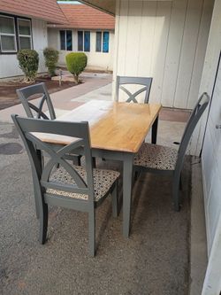 TABLE AND FOUR CHAIRS.