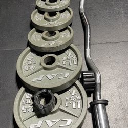 OLYMPIC WEIGHTS WITH A CURLBAR