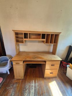 Wooden computer desk with lots of storage