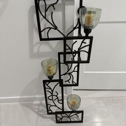 Adorno de pared con velas