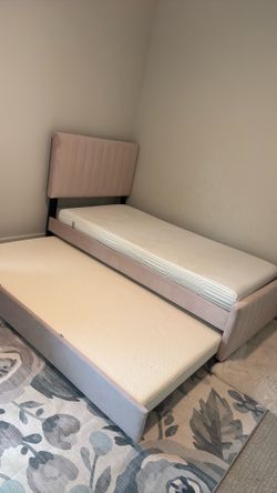 Twin upholster bed with trundle plus both mattress