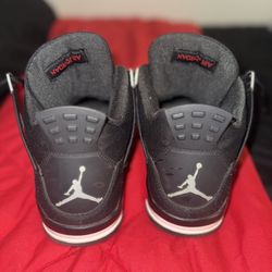 Black Canvas Jordan 4s 