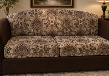 Chocolate colored couch and loveseat