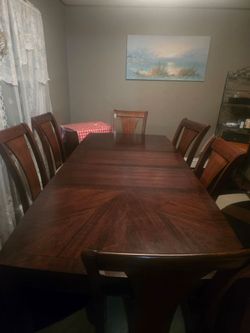 Dinner table with pull out leaf
