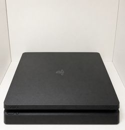 PlayStation 4 Slim 1TB Complete in Box – Tested & Ready to Play