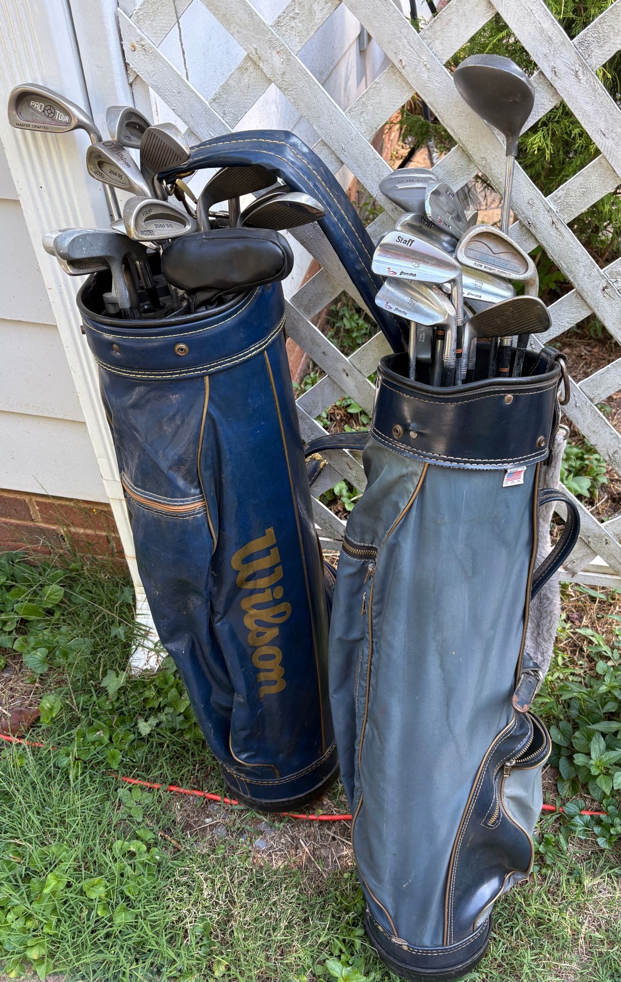 2 Vintage Golf Bags with Mixed Clubs – Wilson & Others