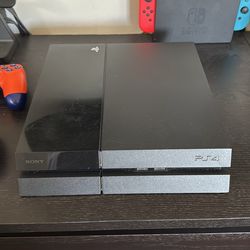 PlayStation 4 with 2 controllers without joystick grip