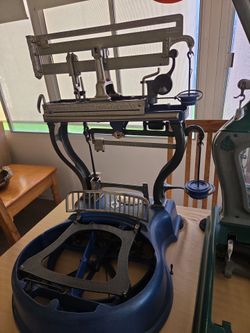Antique cast iron and nickel plated brass carriage.