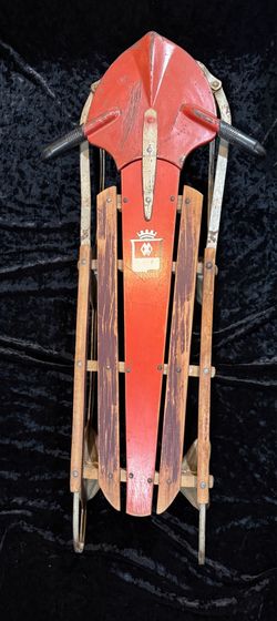 vintage 1940s or 1950s Red Rocket wooden and metal sled rustic interior design
