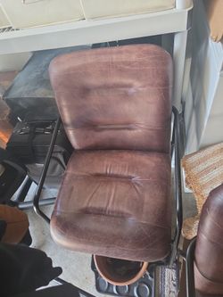 Two dining room chairs. Leather. Sturdy