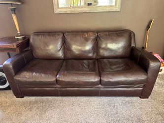 Brown leather 9’ sofa with queen pullout